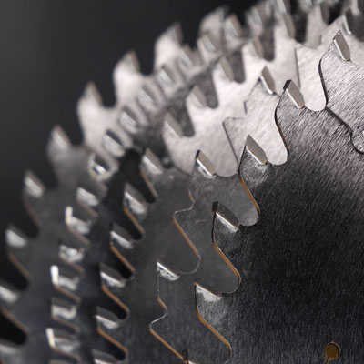 a stack of grizzly extreme series blades in different sizes and tooth configurations