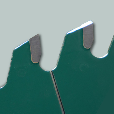 a closeup of the c4 carbide teeth on a grizzly pro blade
